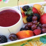Fruit Array with Goat Cheese Medallions ‘n Berry Coulis